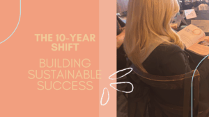Woman reading a workbook with the text 'The 10 Year Shift: Building Sustainable Success'