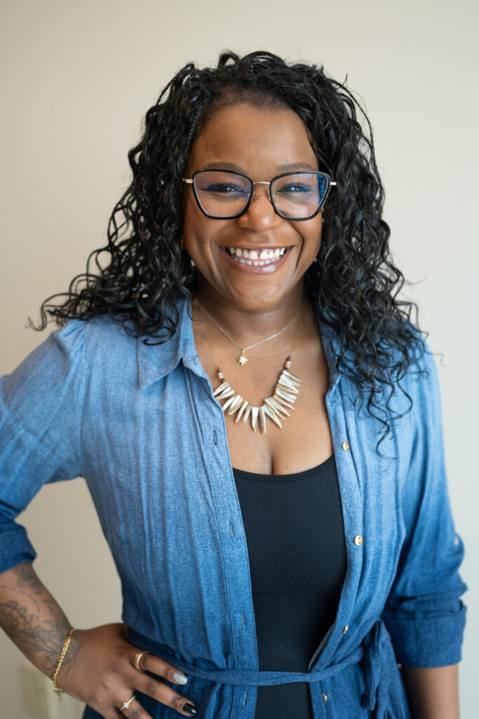 Woman in glasses smiling